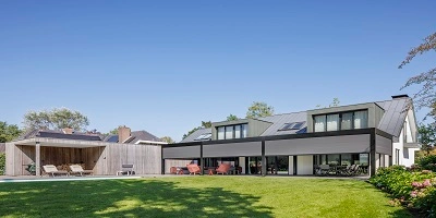 Grote woning met dubbele terrasoverkapping en ruime tuin