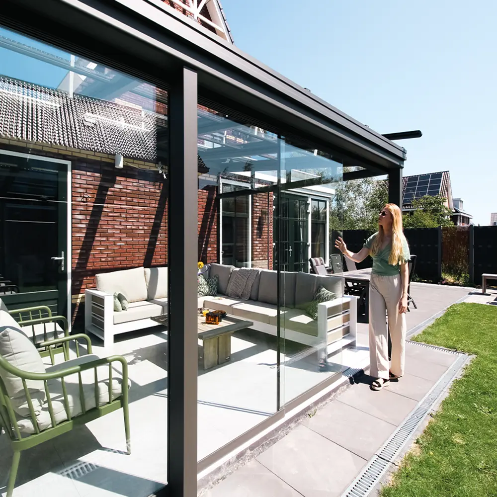 Classic glazen schuifdak met tuin en terras bij woning