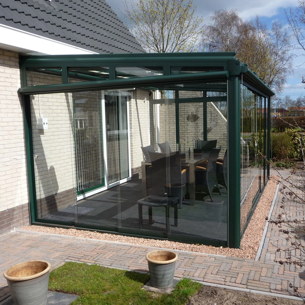 Glazen tuinkamer Terrazza Sempra met eettafel en glazen schuifwanden