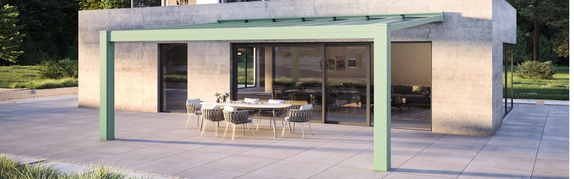 Glazen terrasoverkapping CR in lichtgroene kleur met eettafel op groot terras