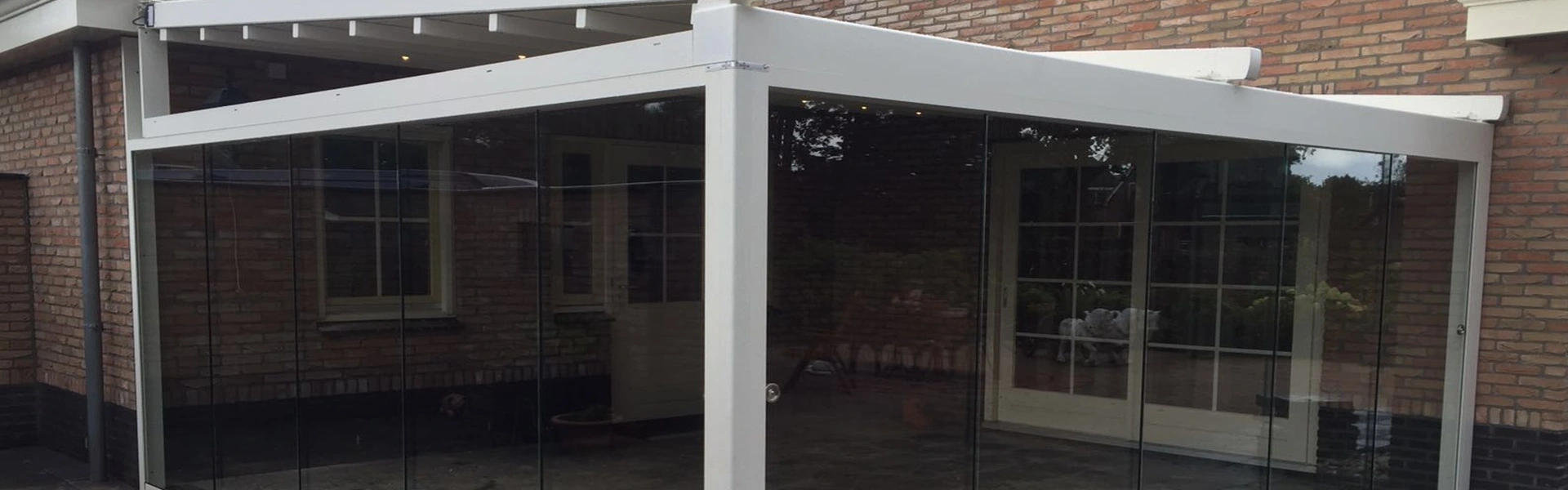 Veldman Zonwering glazen tuinkamer bij woning in Wolvega Veldman Zonwering glazen tuinkamer bij woning in Wolvega