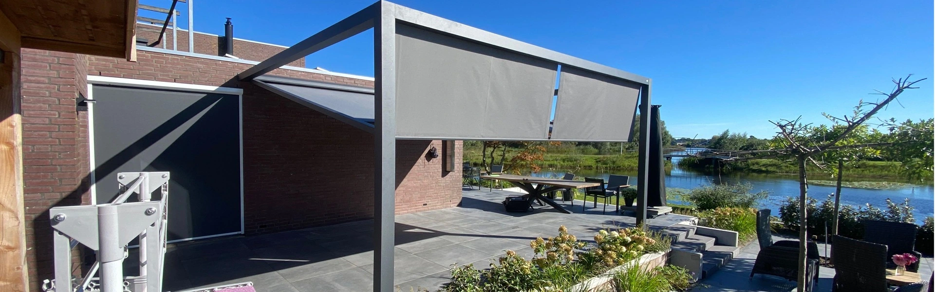 Veldman Zonwering textieloverkapping met uitzicht op Heidemeer terras Veldman Zonwering textieloverkapping met uitzicht op Heidemeer terras