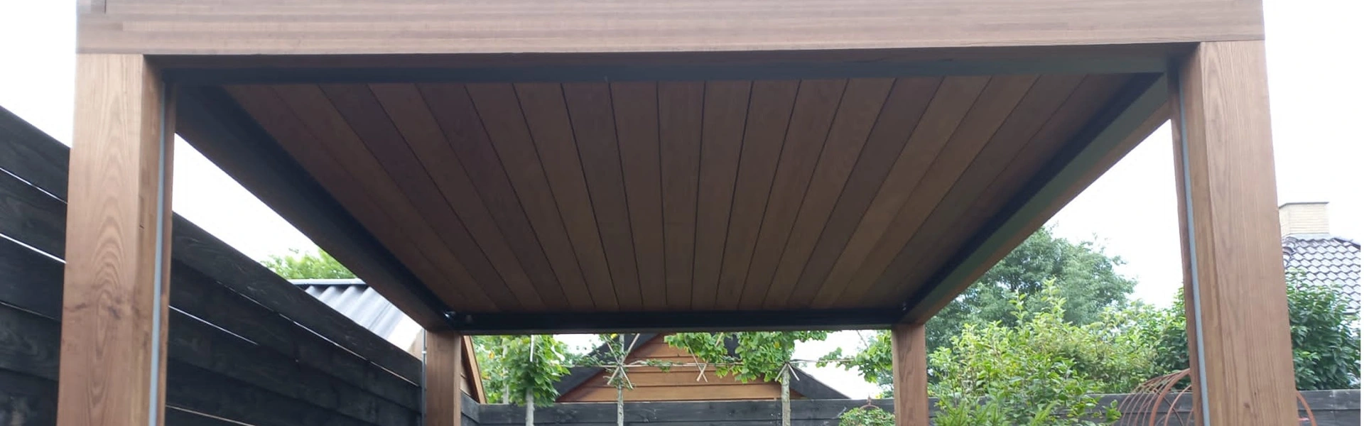 Houten lamellen overkapping in Grootegast project Veldman Zonwering Houten lamellen overkapping in Grootegast project Veldman Zonwering