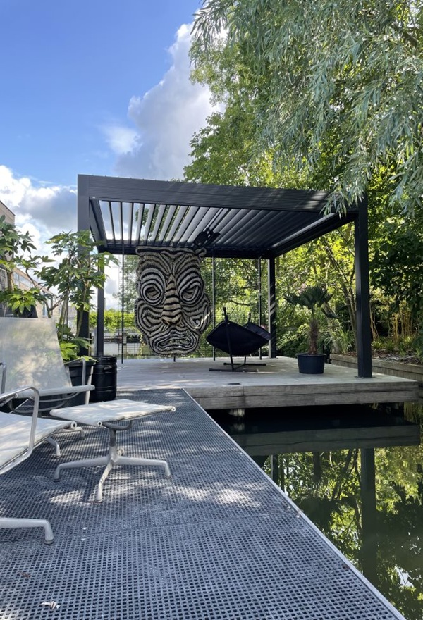 Lamellen dak met uitzicht op water Amsterdam Veldman Zonwering Lamellen dak met uitzicht op water Amsterdam Veldman Zonwering